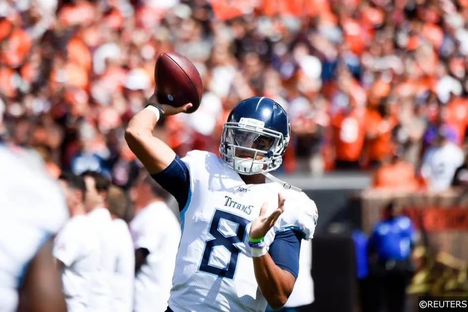 Marcus Mariota will beat out Derek Carr in Las Vegas