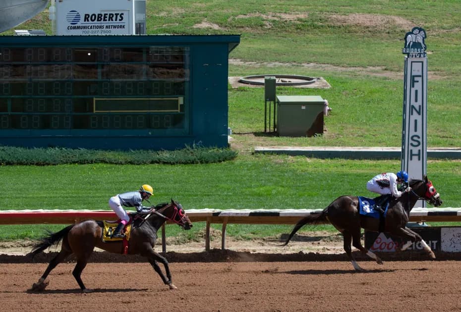 Horse Racing picks for Gulfstream Park race track on Thursday, April 27: Raison the Glass in the winner's circle