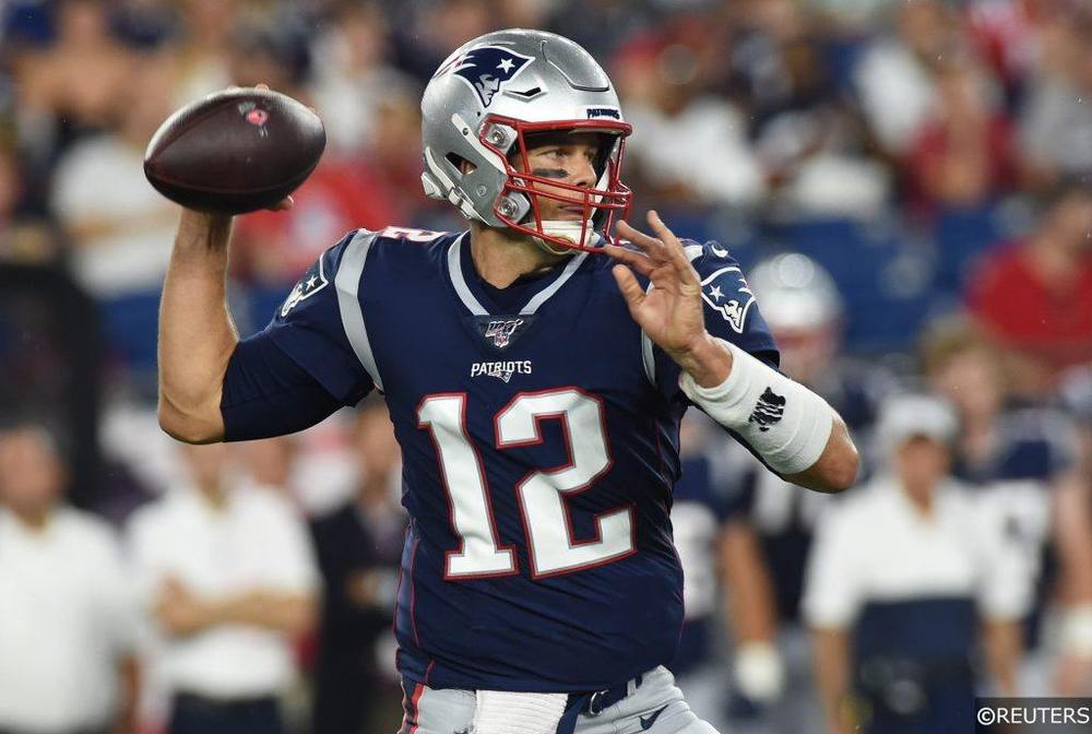 Tom Brady playing quarterback for the New England Patriots