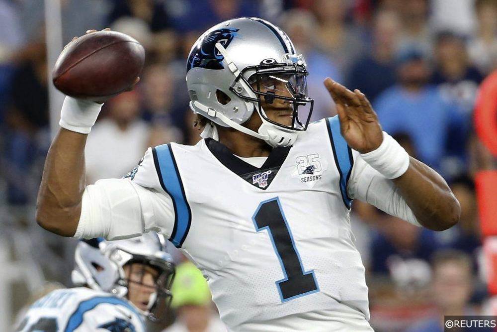 Cam Newton Throwing A Football For The Carolina Panthers
