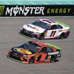 Denny Hamlin and Martin Truex Jr turn laps during practice for Ford EcoBoost 400 at Homsetead-Miami Speedway