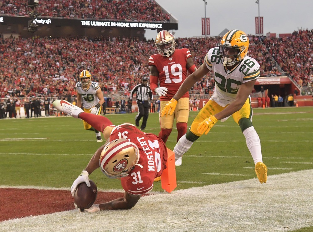 Raheem Mostert of the San Francisco 49ers scores in the NFC Championship.