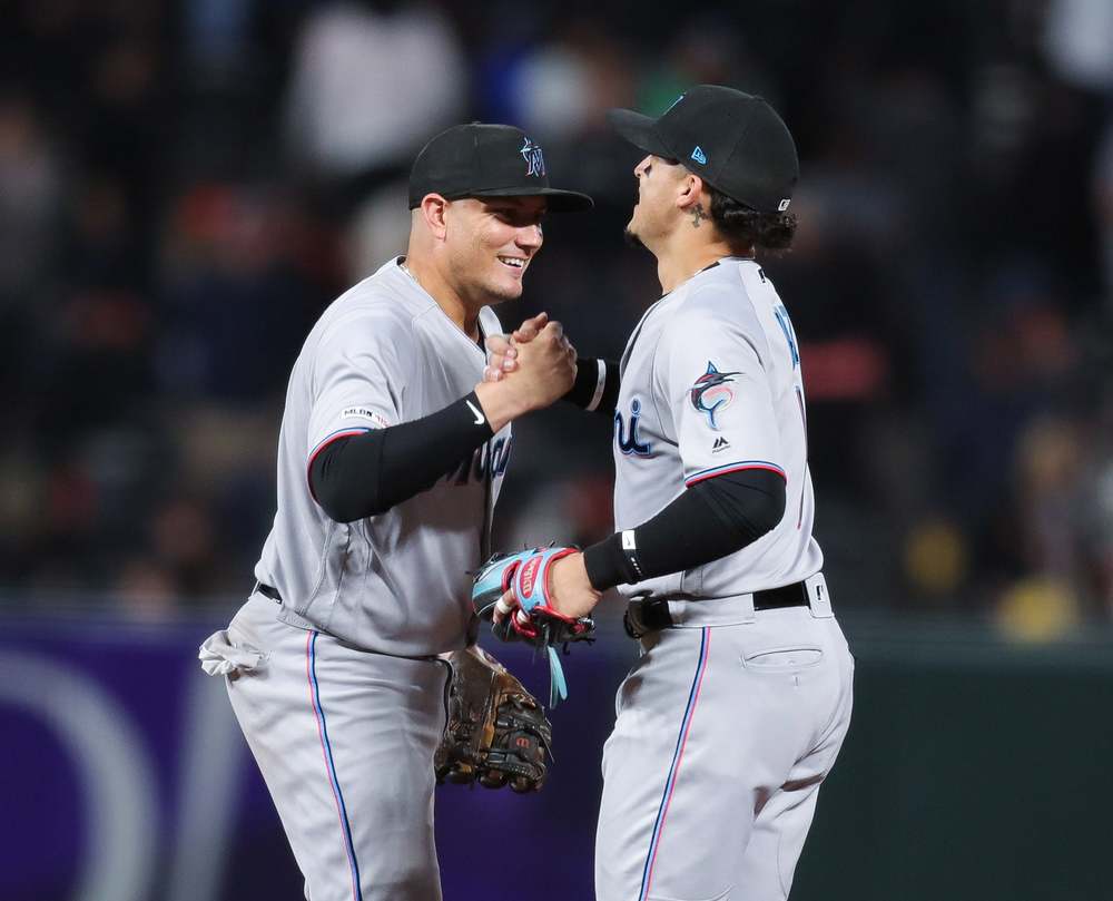Miguel Rojas and Isan Diaz of the Miami Marlins