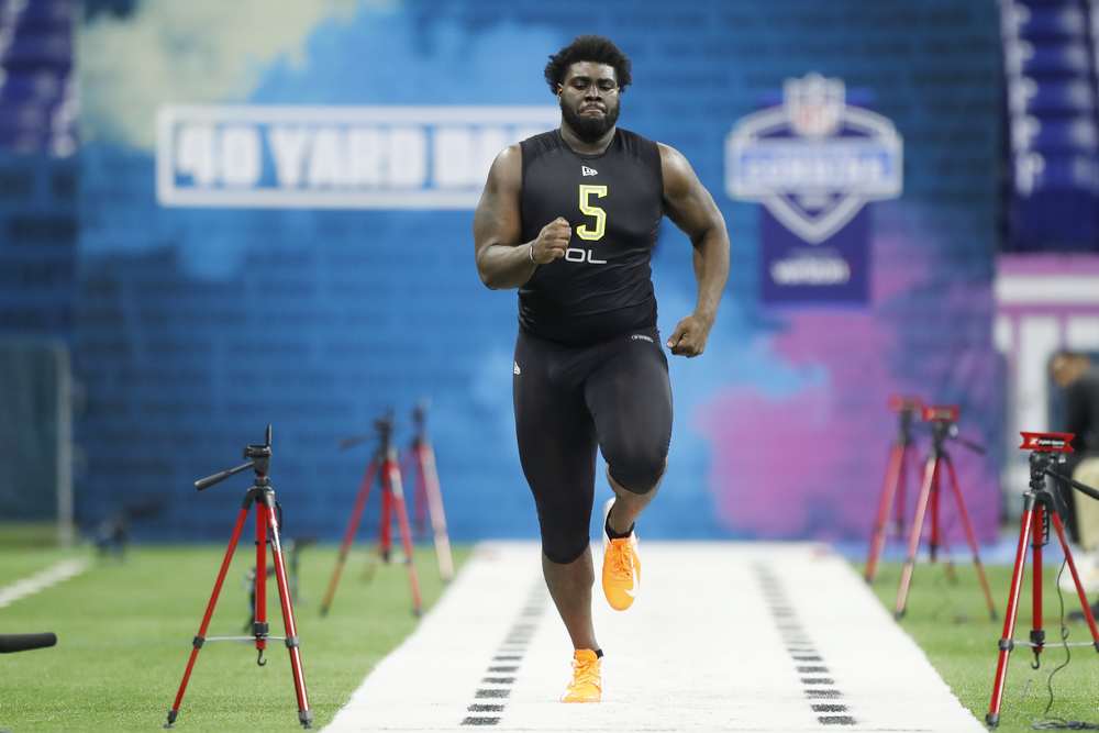 Louisville offensive lineman Mekhi Becton runs the 40-yard dash at the NFL Combine.