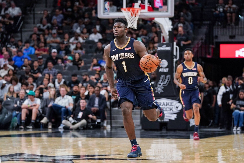 Zion Williams of the New Orleans Pelicans dribbles the ball up the court.