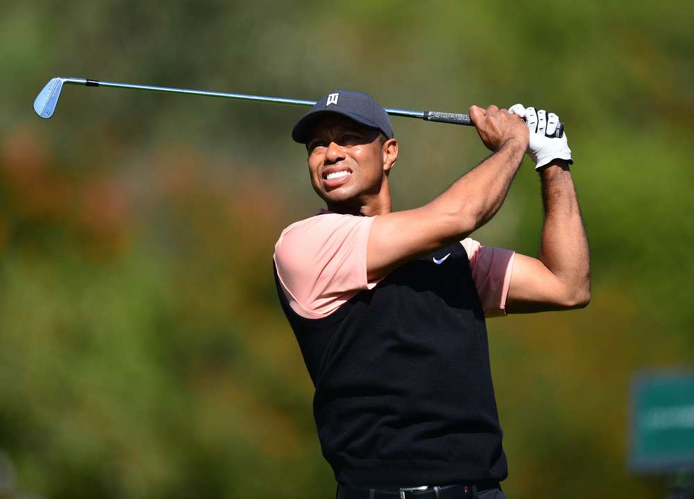 Tiger Woods hits a shot at Riviera.