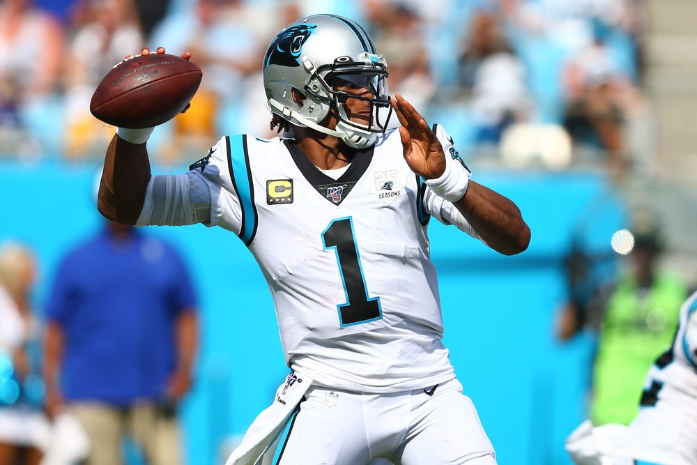 QB Cam Newton throwing the football
