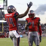 XFL player Cam Phillips celebrating a touchdown
