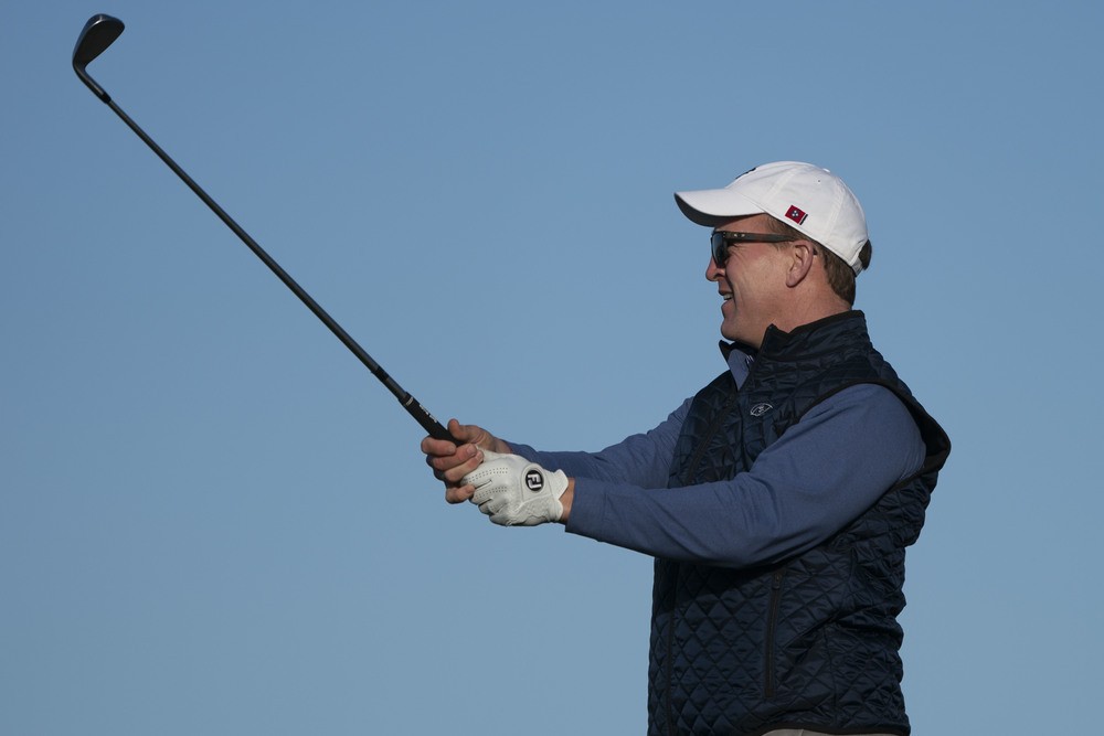 Peyton Manning golfing