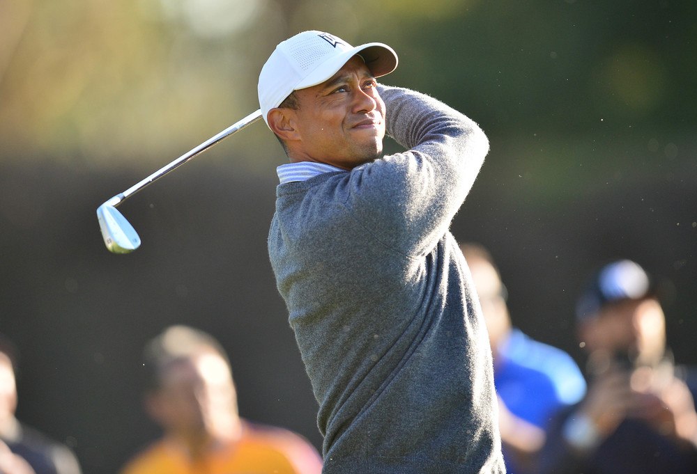 Tiger Woods hits a shot at the Genesis Invitational.