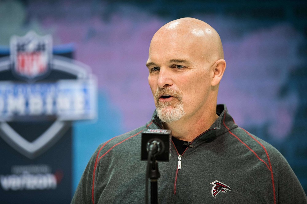 Atlanta Falcons head coach Dan Quinn speaks at the NFL Combine.