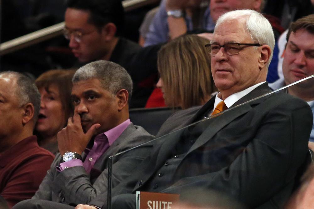 Phil Jackson watches a New York Knicks game.