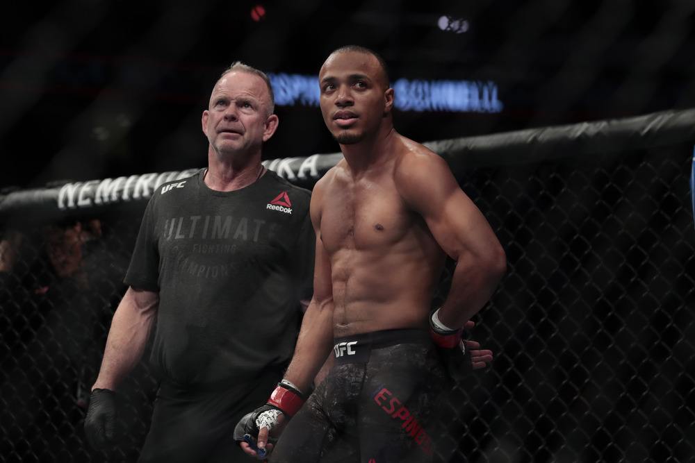 Jordan Espinosa (red gloves) looks on against Matt Schnell (not pictured) during UFC Fight Night at Prudential Center.