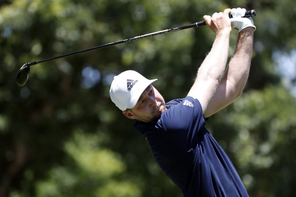 Daniel Berger hits a shot at the Charles Schwab Challenge.