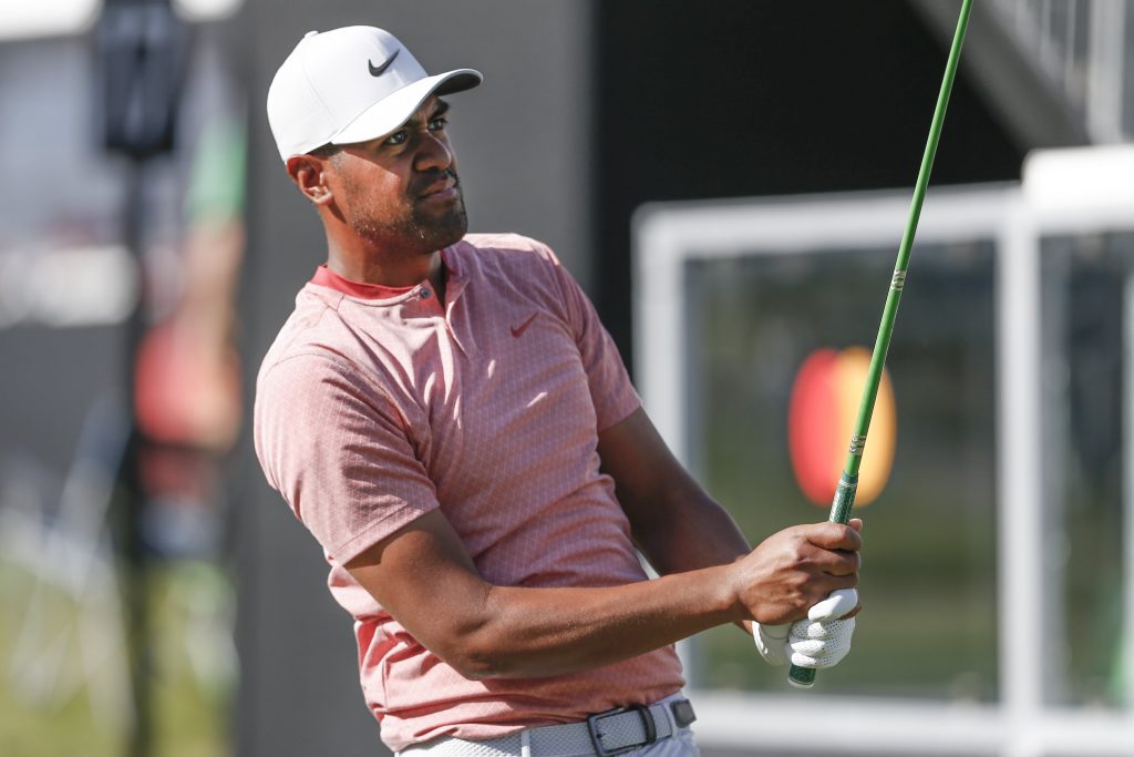 Tony Finau hits a tee shot at The Players Championship.