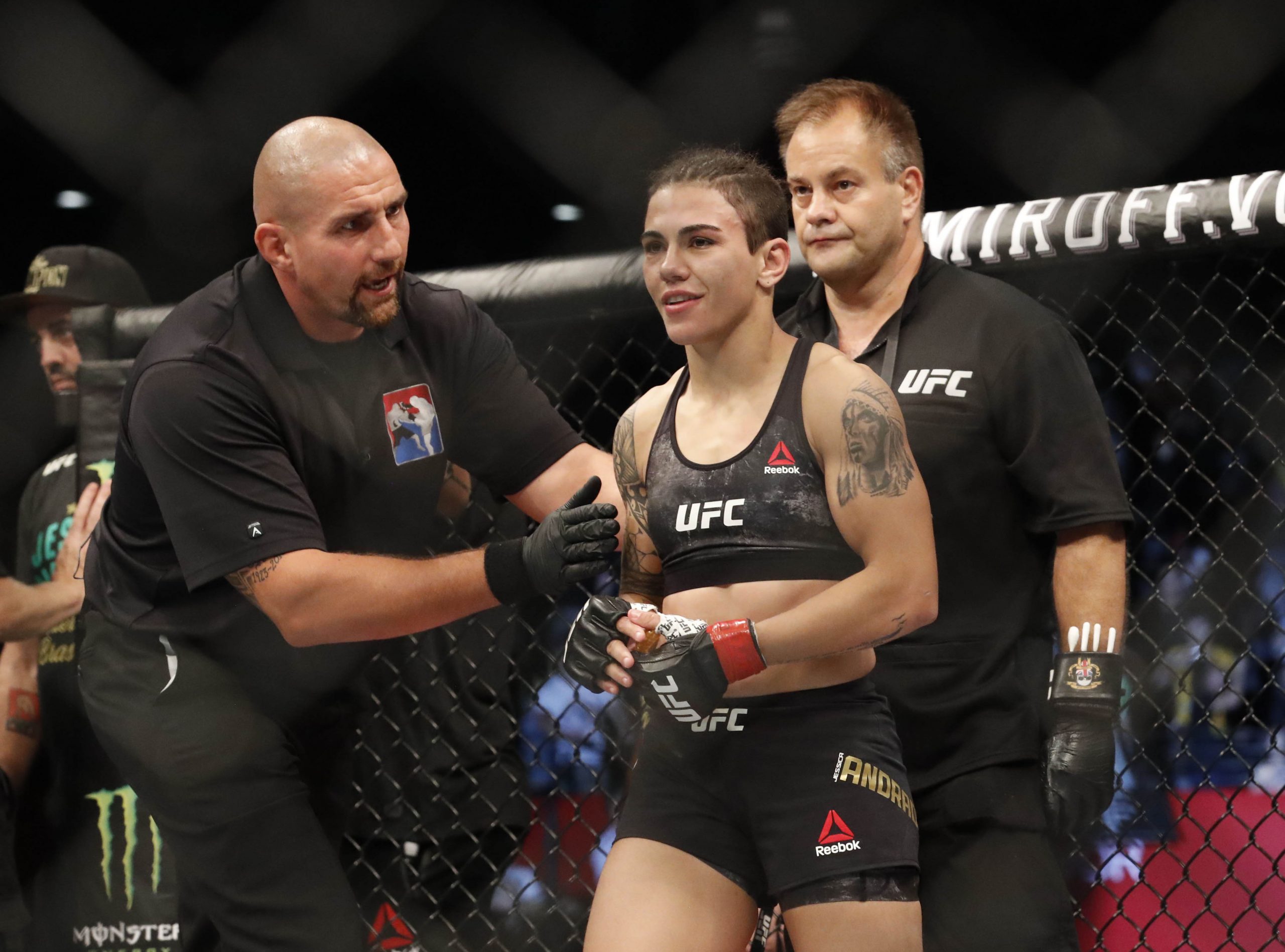Aug 31, 2019; Shenzhen, China; Jessica Andrade (red gloves) after losing to Zhang Weili (blue gloves) during UFC Fight Night at Shenzhen Universiade Sports Centre.