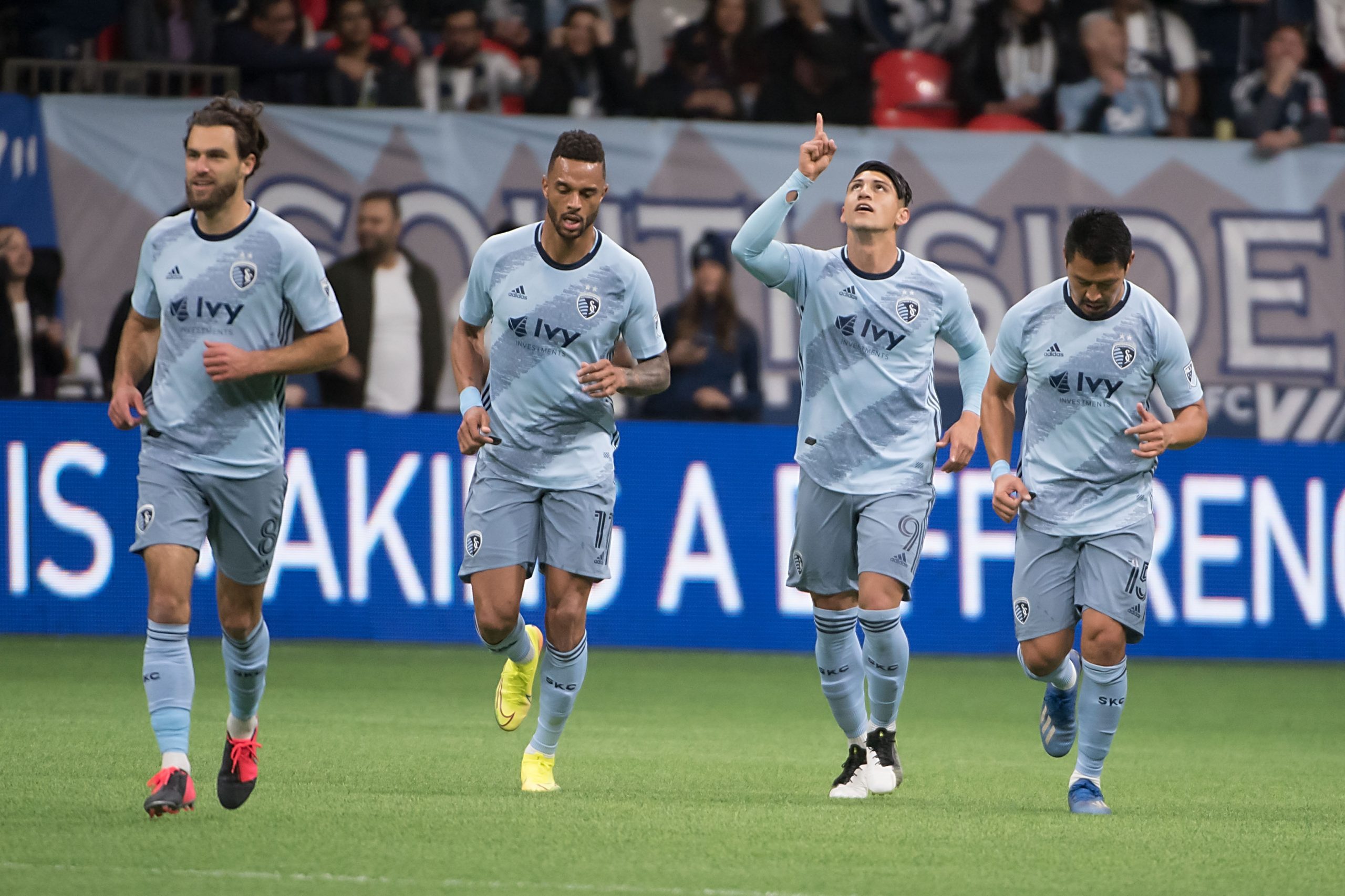Sporting KC forward Alan Pulido (9) celebrates his goal against the Vancouver Whitecaps