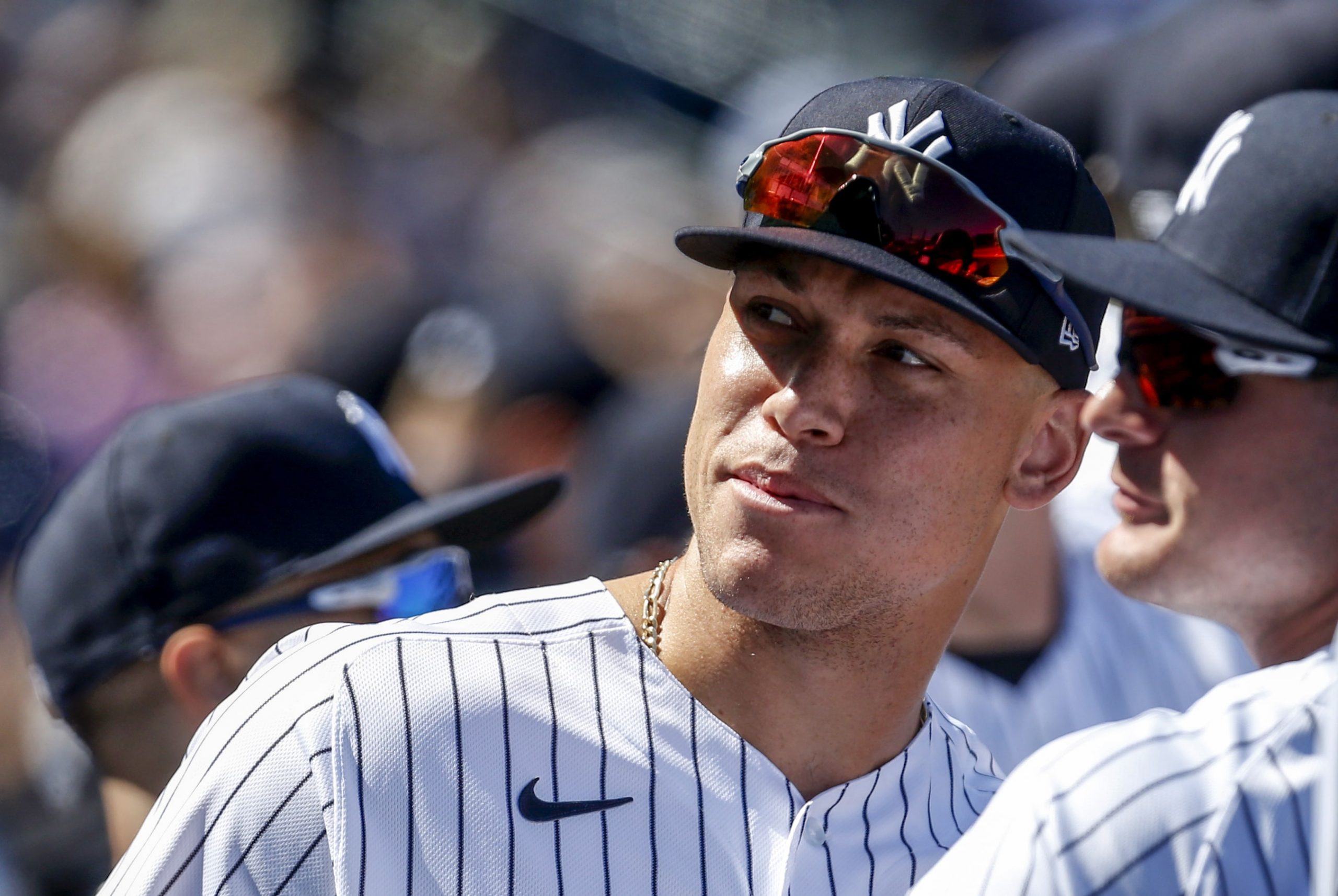 Aaron Judge of the New York Yankees hangs out in the dugout.