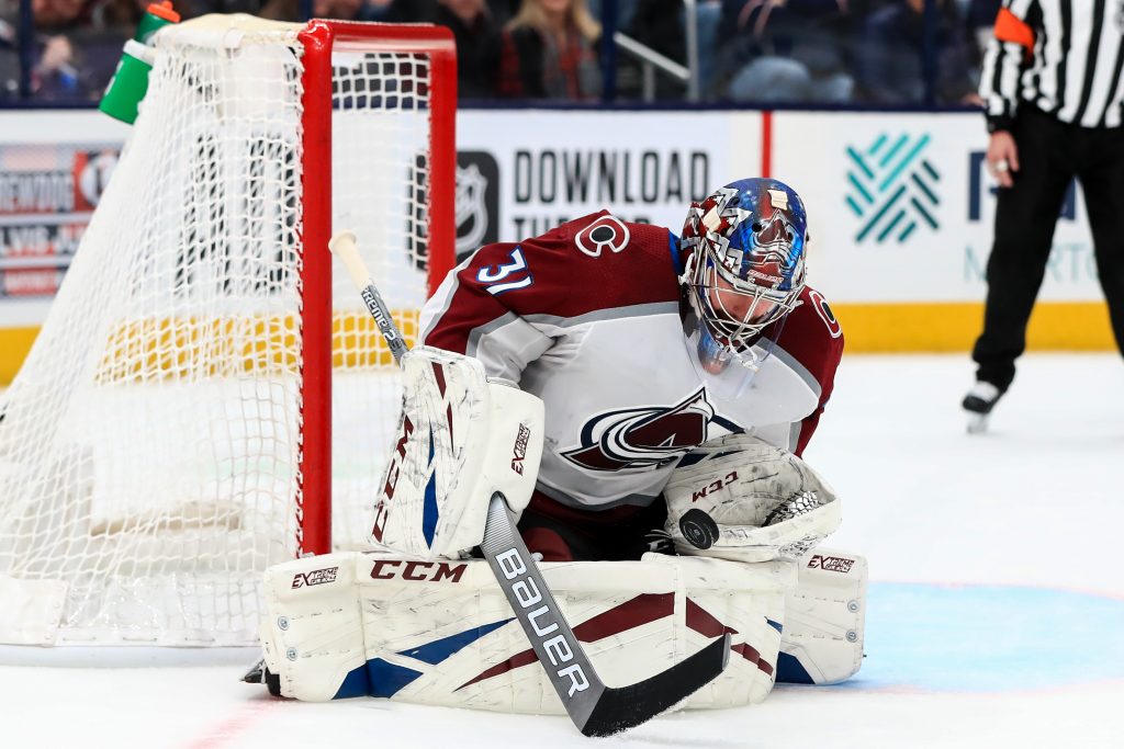 Philipp Grubauer (31) makes a save in net