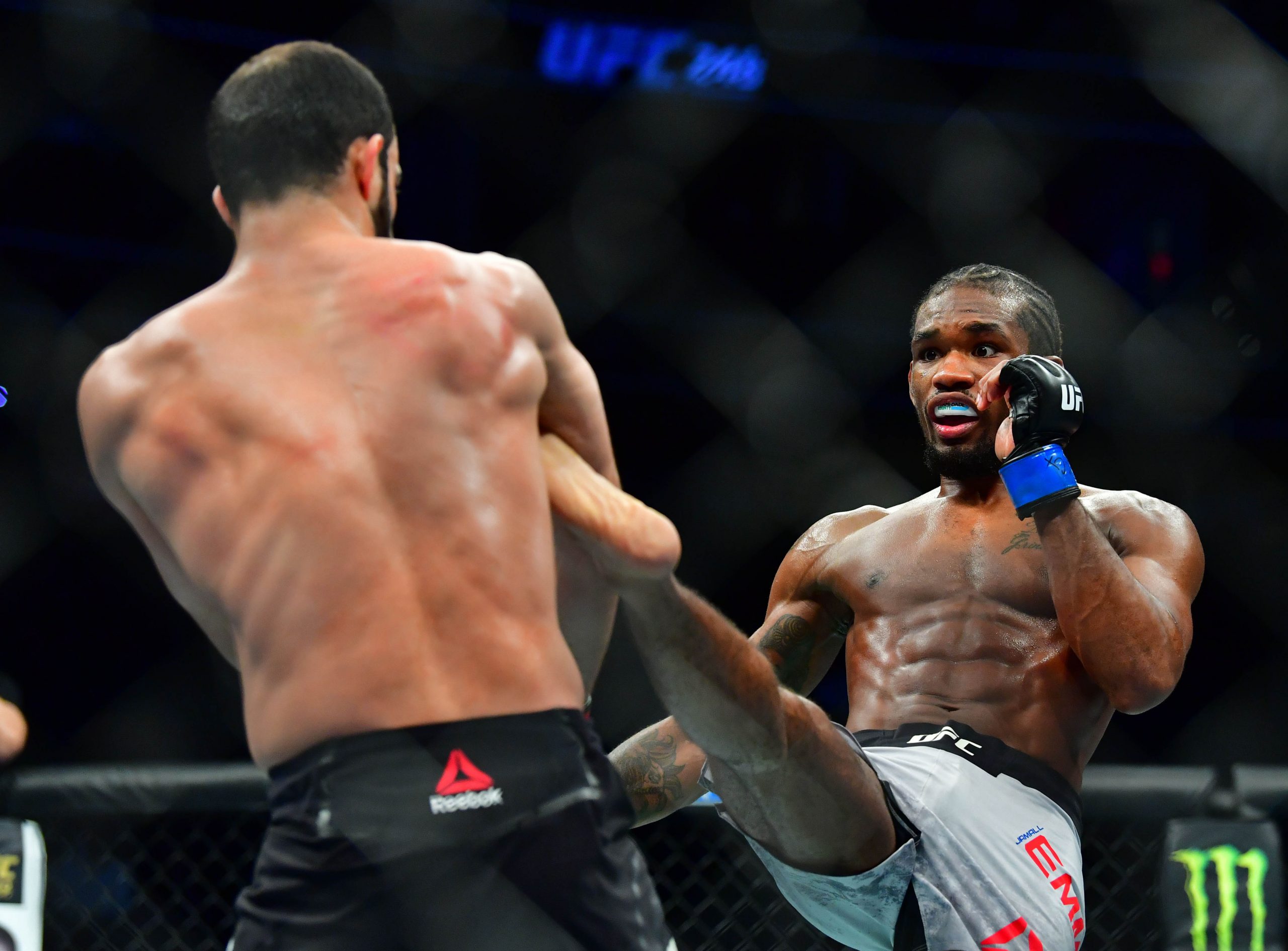 Mar 7, 2020; Las Vegas, Nevada, USA; Giga Chikadze (red gloves) fights Jamall Emmers (blue gloves) during UFC 248 at T-Mobile Arena.