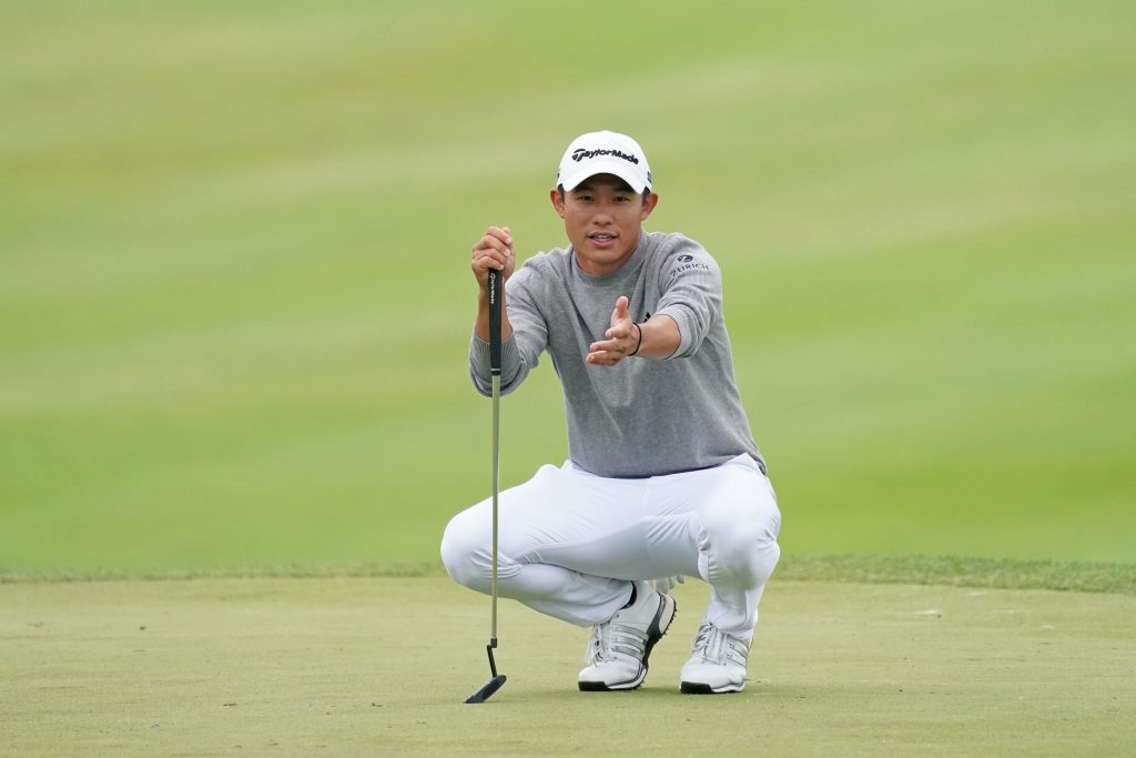 Collin Morikawa reads a putt at the PGA Championship.