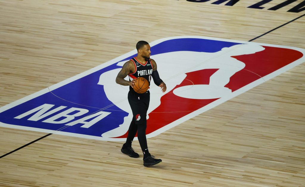 Damian Lillard of the Portland Trail Blazers dribbles up the court.