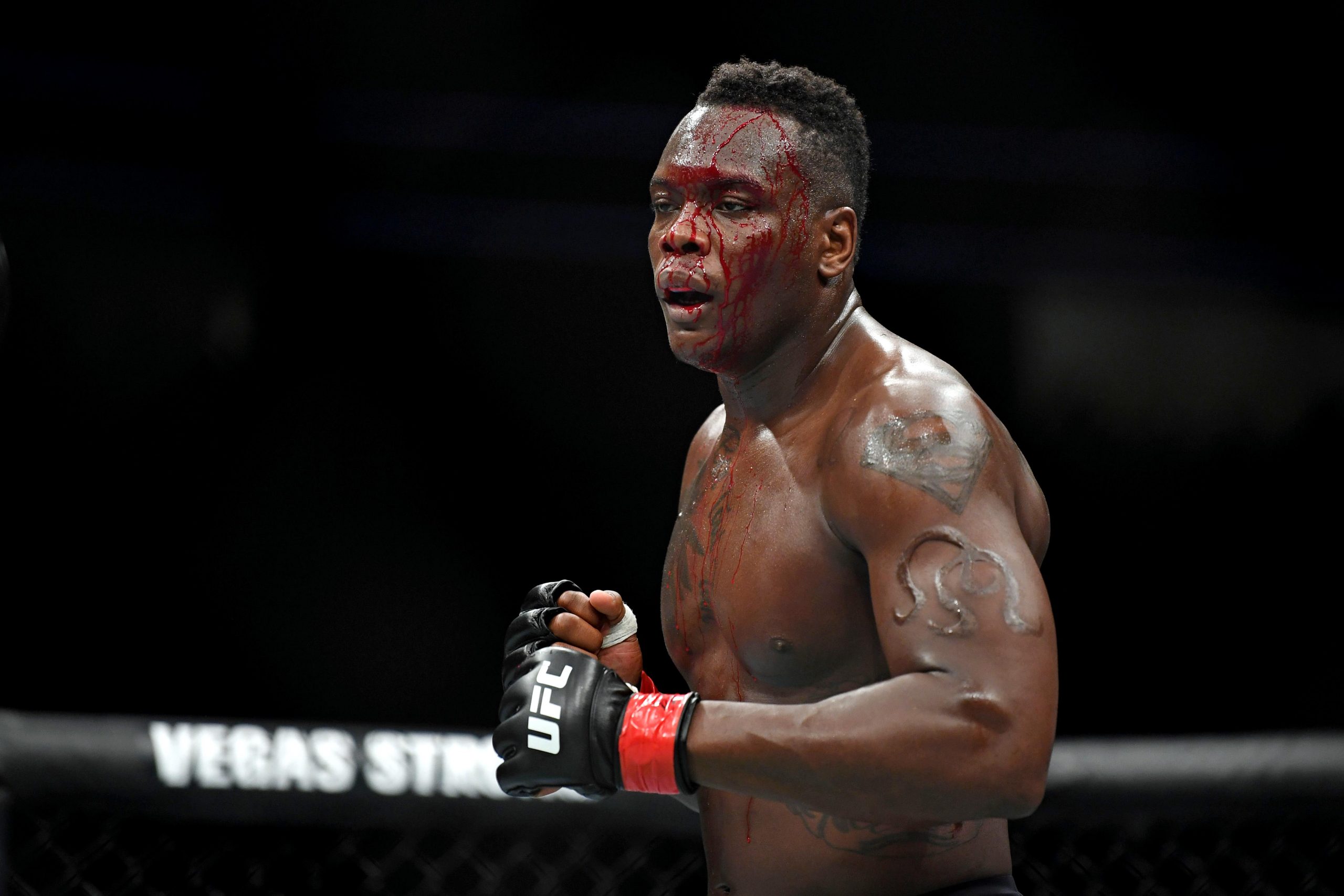 Ovince Saint Preux (red gloves) fights Dominick Reyes