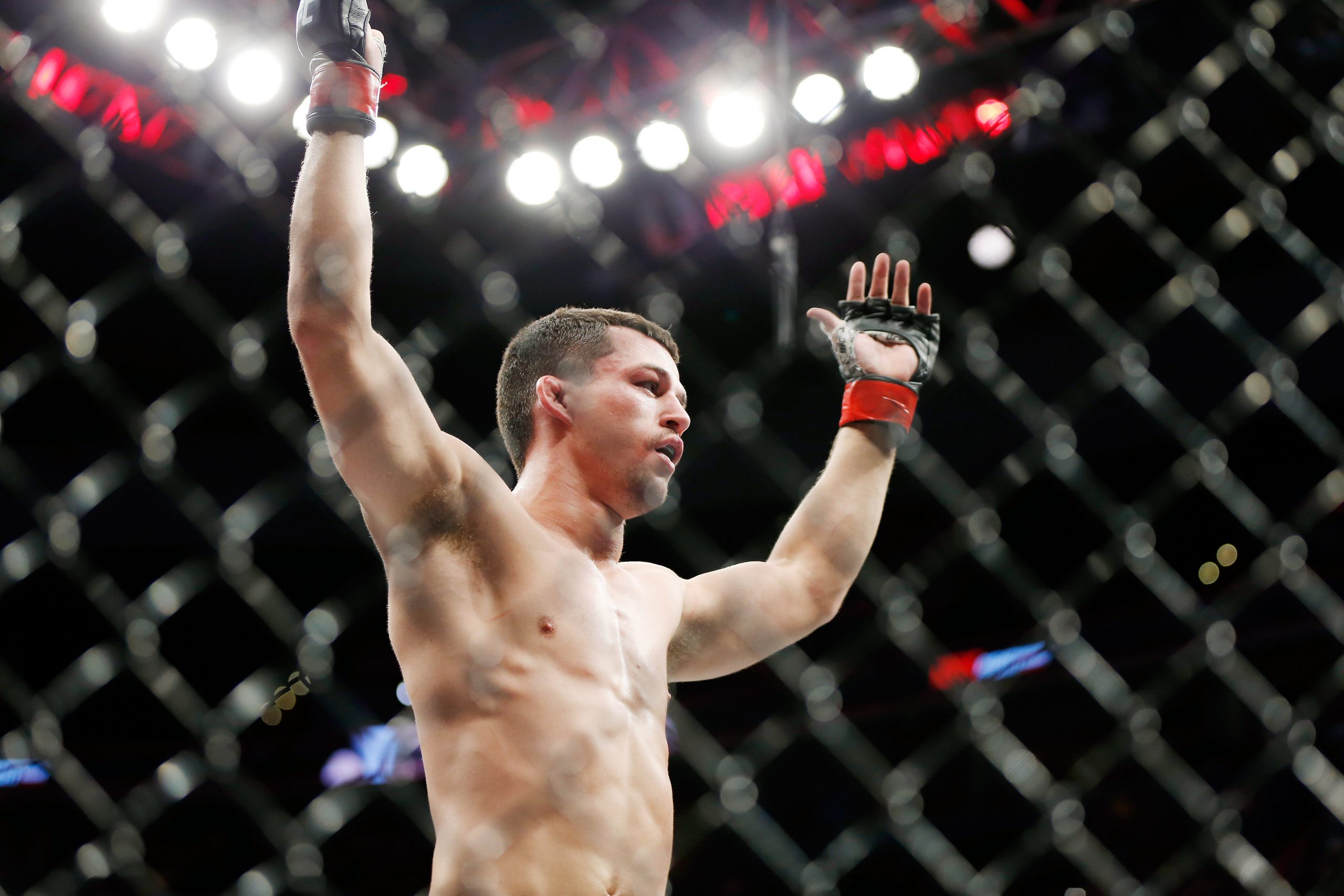 Dec 7, 2019; Washington, DC, USA; Billy Quarantillo (red gloves) after his win over Jacob Kilburn (not pictured) during UFC Fight Night at Capital One Arena.