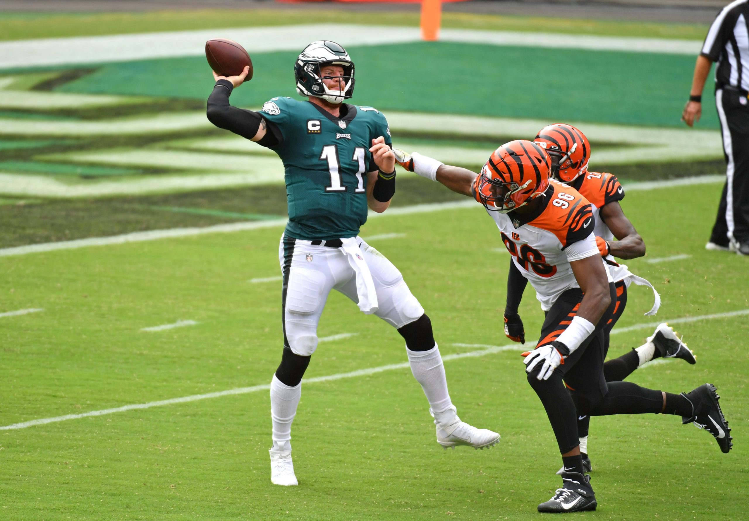 Philadelphia Eagles quarterback Carson Wentz throws a pass under pressure from Cincinnati Bengals defensive end Carlos Dunlap during the second quarter at Lincoln Financial Field.