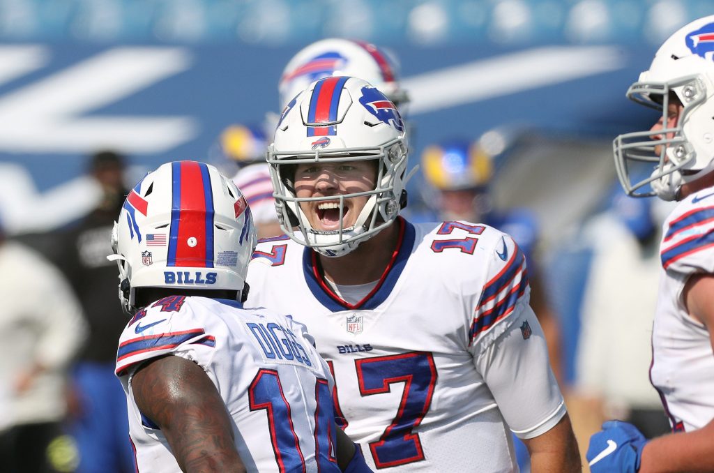 Bills quarterback Josh Allen celebrating after receiver Stefon Diggs' four-yard touchdown catch in a 35-32 win over the Rams.