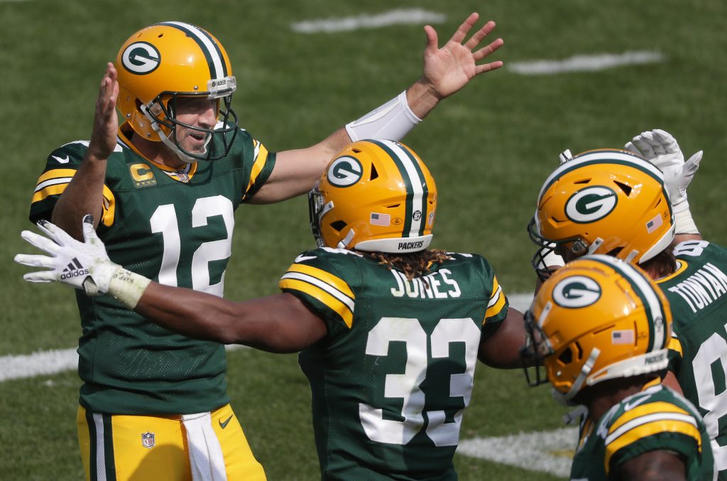 Green Bay Packers quarterback Aaron Rodgers and running back Aaron Jones