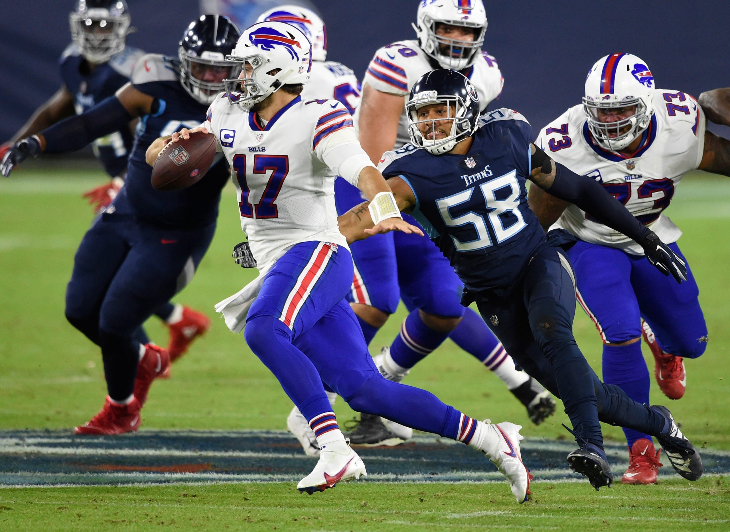 Buffalo Bills quarterback Josh Allen is sacked by Tennessee Titans linebacker Harold Landry
