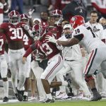 Oct 17, 2020; Tuscaloosa, Alabama, USA; Georgia offensive lineman Warren McClendon (70) forces Alabama defensive back Malachi Moore (13) out of bounds after Moore intercepted a pass during the second half of Alabama's 41-24 win over Georgia at Bryant-Denny Stadium.