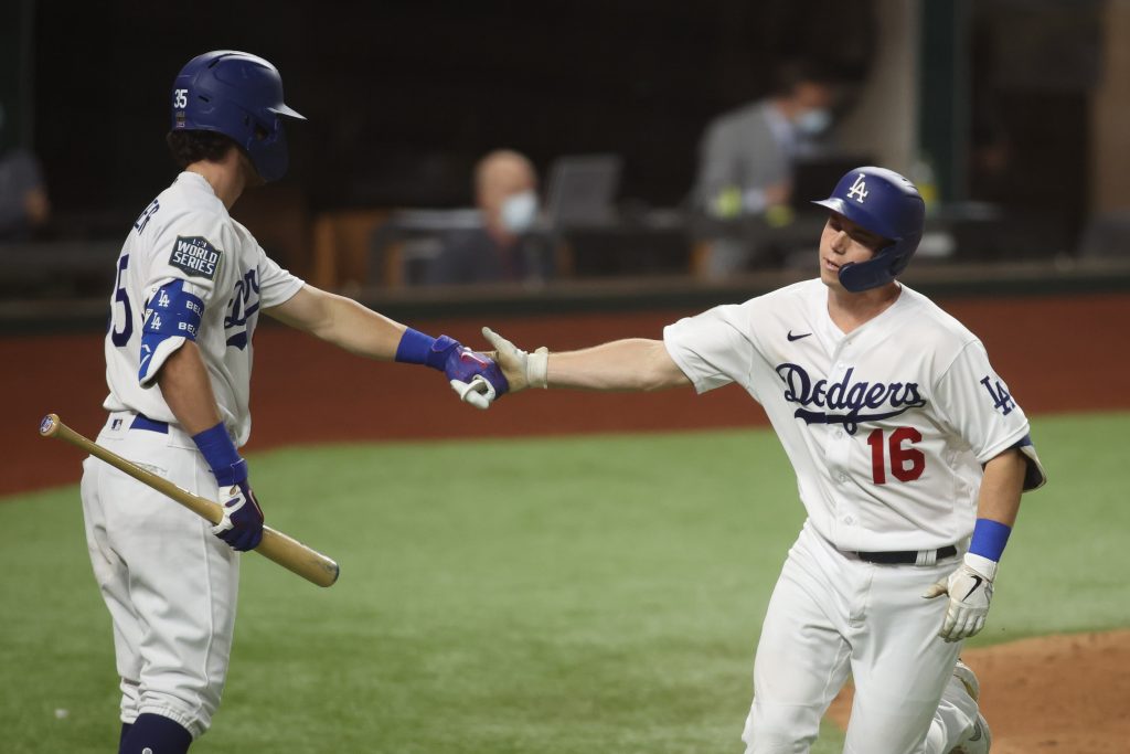 Los Angeles Dodgers catcher Will Smith celebrates with outfielder Cody Bellinger during World Series game against the Tampa Bay Rays