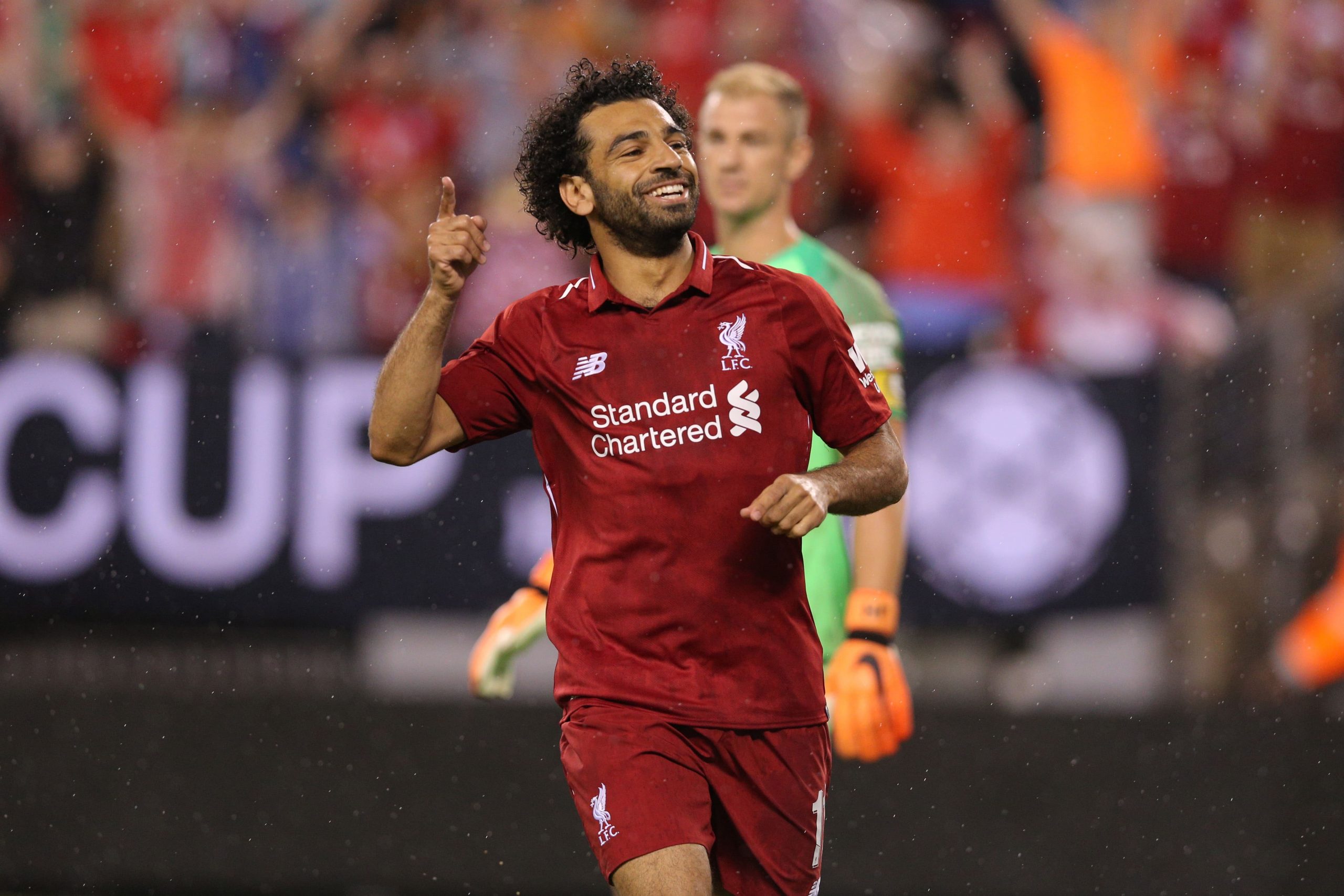 Liverpool forward Mohamed Salah celebrates his goal against Manchester City during the second half of an International Champions Cup soccer match at MetLife Stadium.