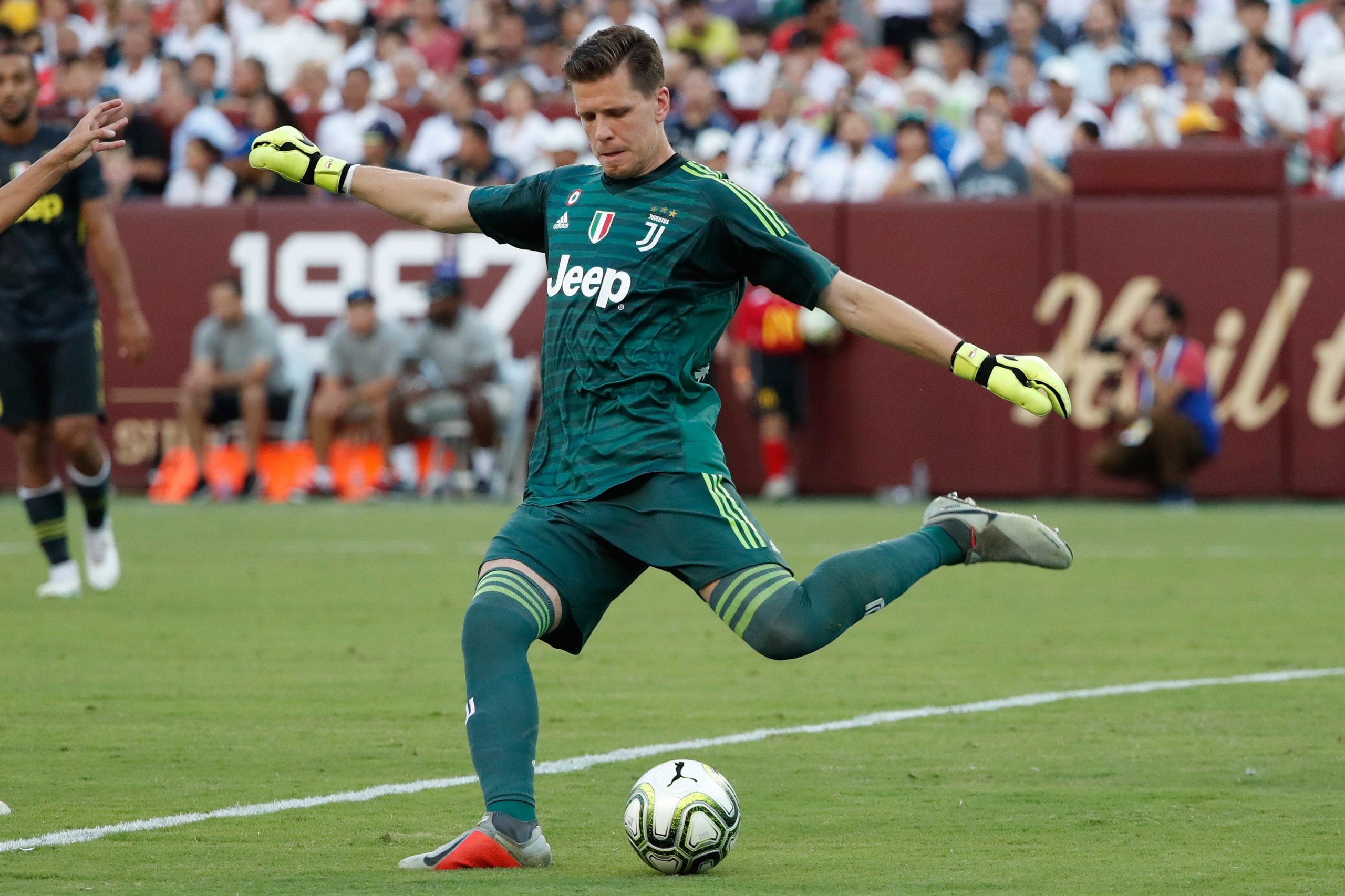 Juventus goalkeeper Wojciech Szczesny kicks the ball against Real Madrid during an International Champions Cup soccer match at FedEx Field.