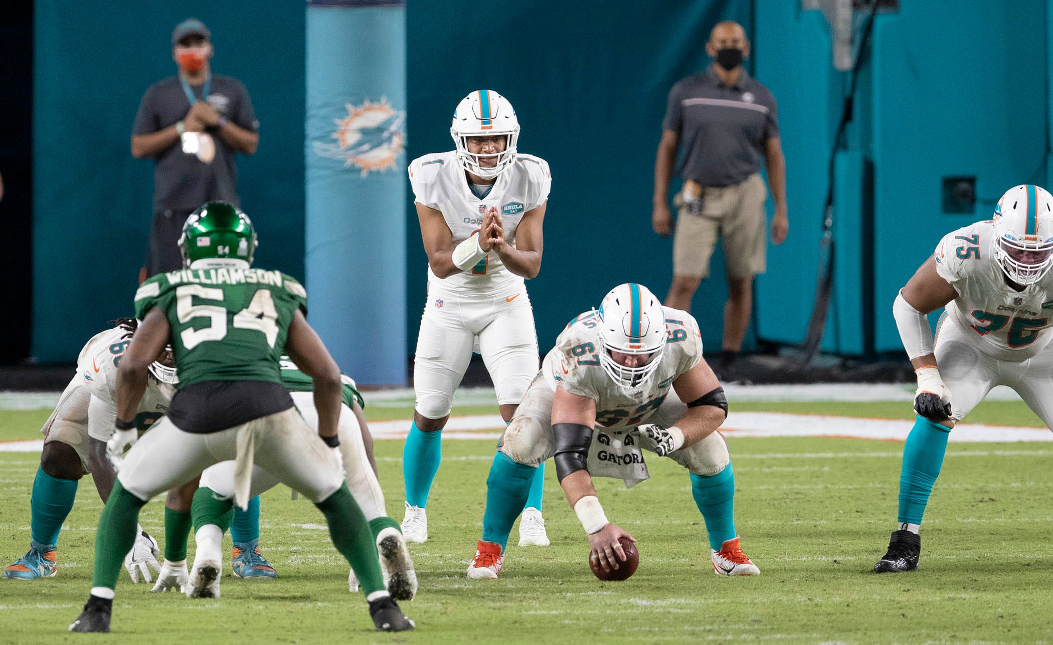 Miami Dolphins quarterback Tua Tagovailoa (1) takes his first snap against the New York Jets at Hard Rock Stadium in Miami Gardens.