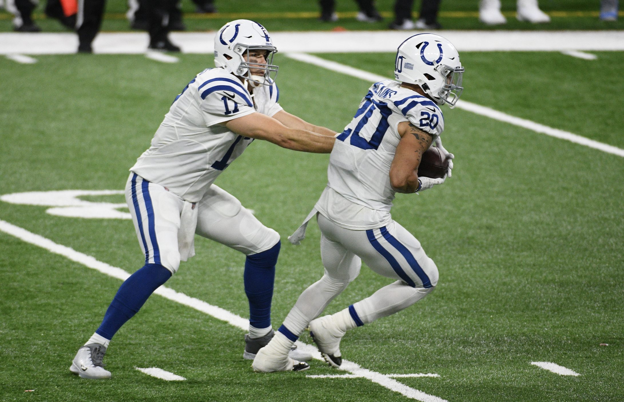 Philip Rivers of the Indianapolis Colts hands the ball off