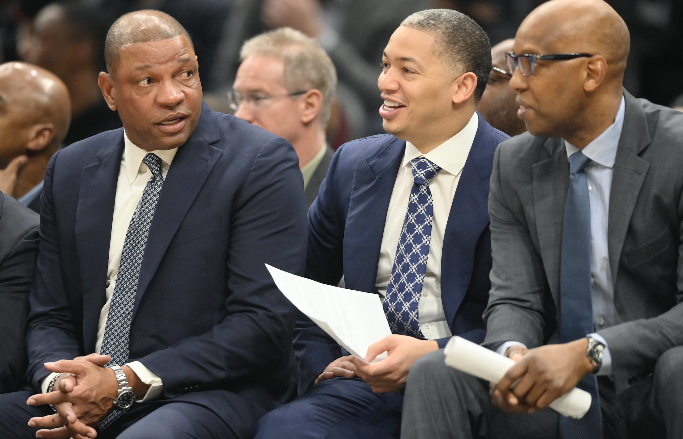 Doc Rivers, Tyronn Lue, and Sam Cassell on the Los Angeles Clippers bench