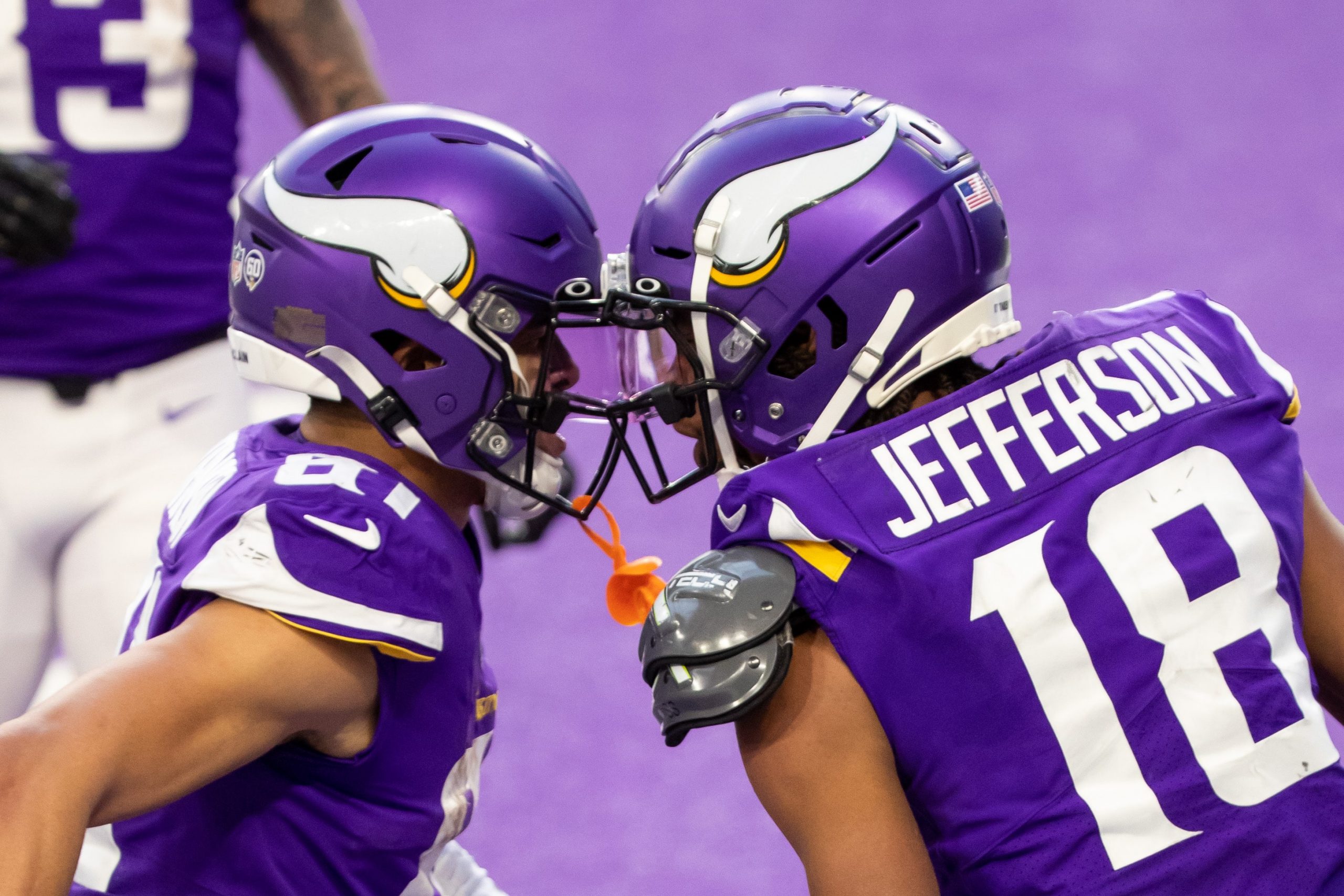 Minnesota Vikings wide receiver Justin Jefferson (18) celebrates his touchdown with wide receiver Bisi Johnson (81) in the fourth quarter against the Carolina Panthers at U.S. Bank Stadium.