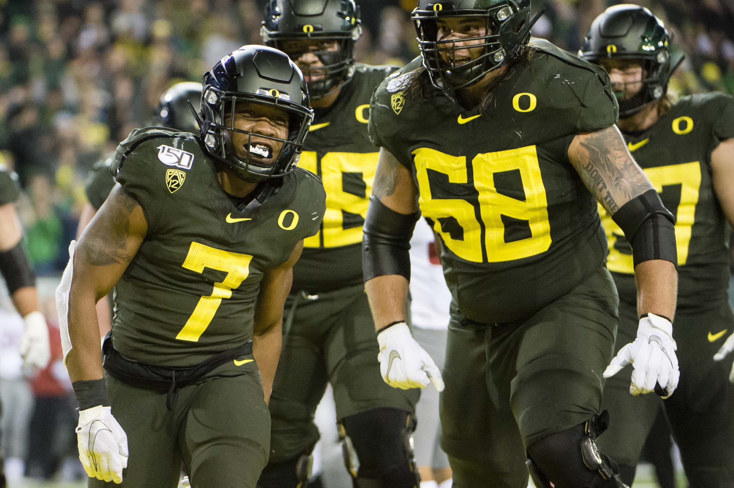 CJ Verdell and the Oregon Ducks celebrate a touchdown