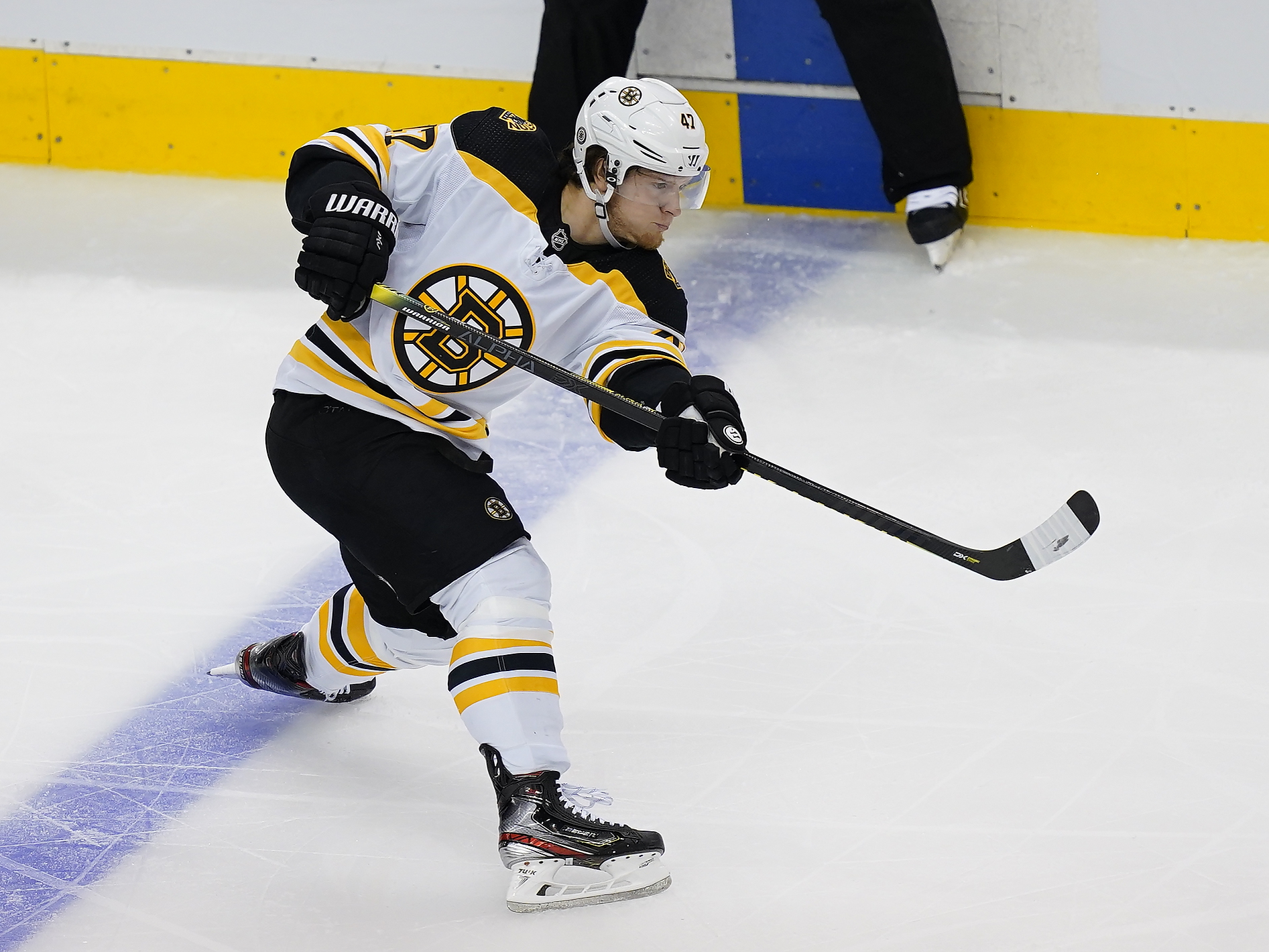Boston Bruins defenseman Torey Krug (47) shoots the puck against the Washington Capitals during the first period of the Eastern Conference qualifications at Scotiabank Arena.