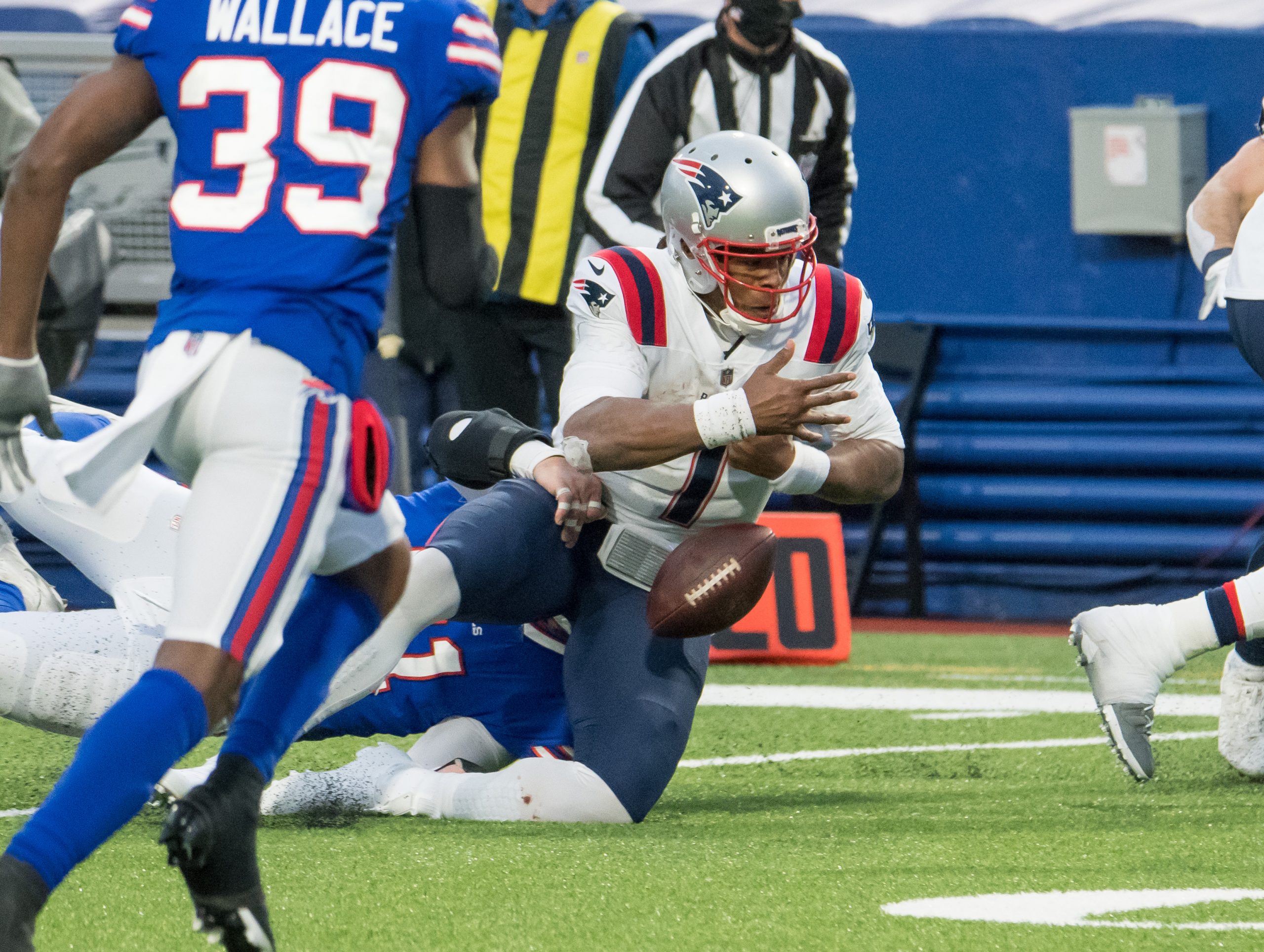 Cam Newton fumbles the ball in New England's 24-21 loss to the Buffalo Bills.