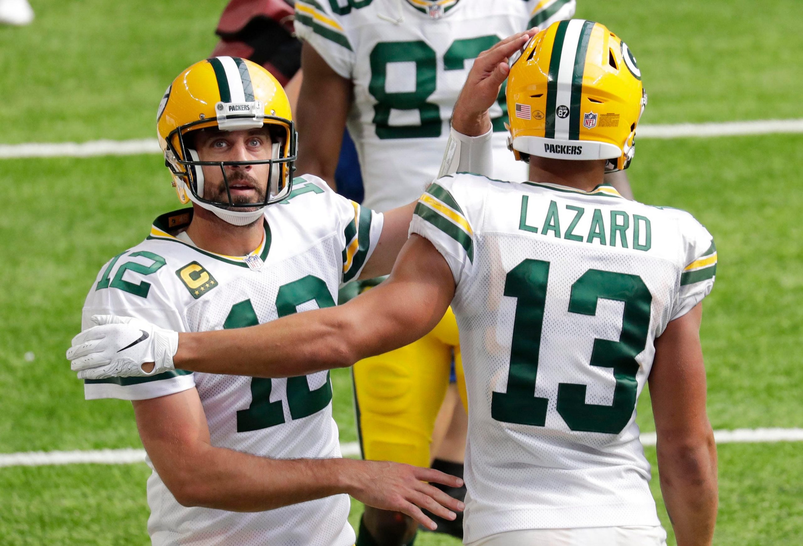 Aaron Rodgers and Allen Lazard of the Green Bay Packers celebrate a touchdown