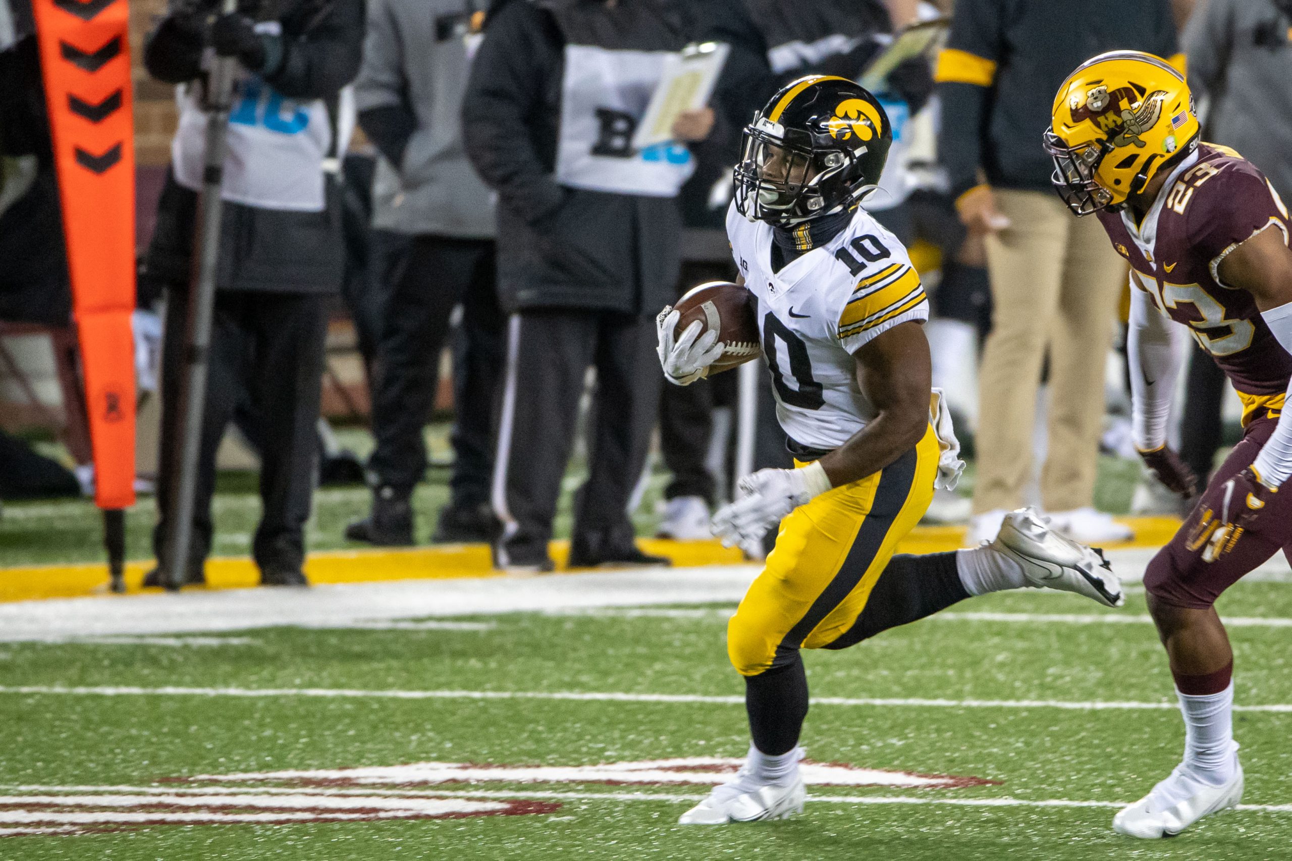 Nov 13, 2020; Minneapolis, Minnesota, USA; Iowa Hawkeyes running back Mekhi Sargent (10) rushes with the ball for a first down in the second half against the Minnesota Golden Gophers at TCF Bank Stadium.