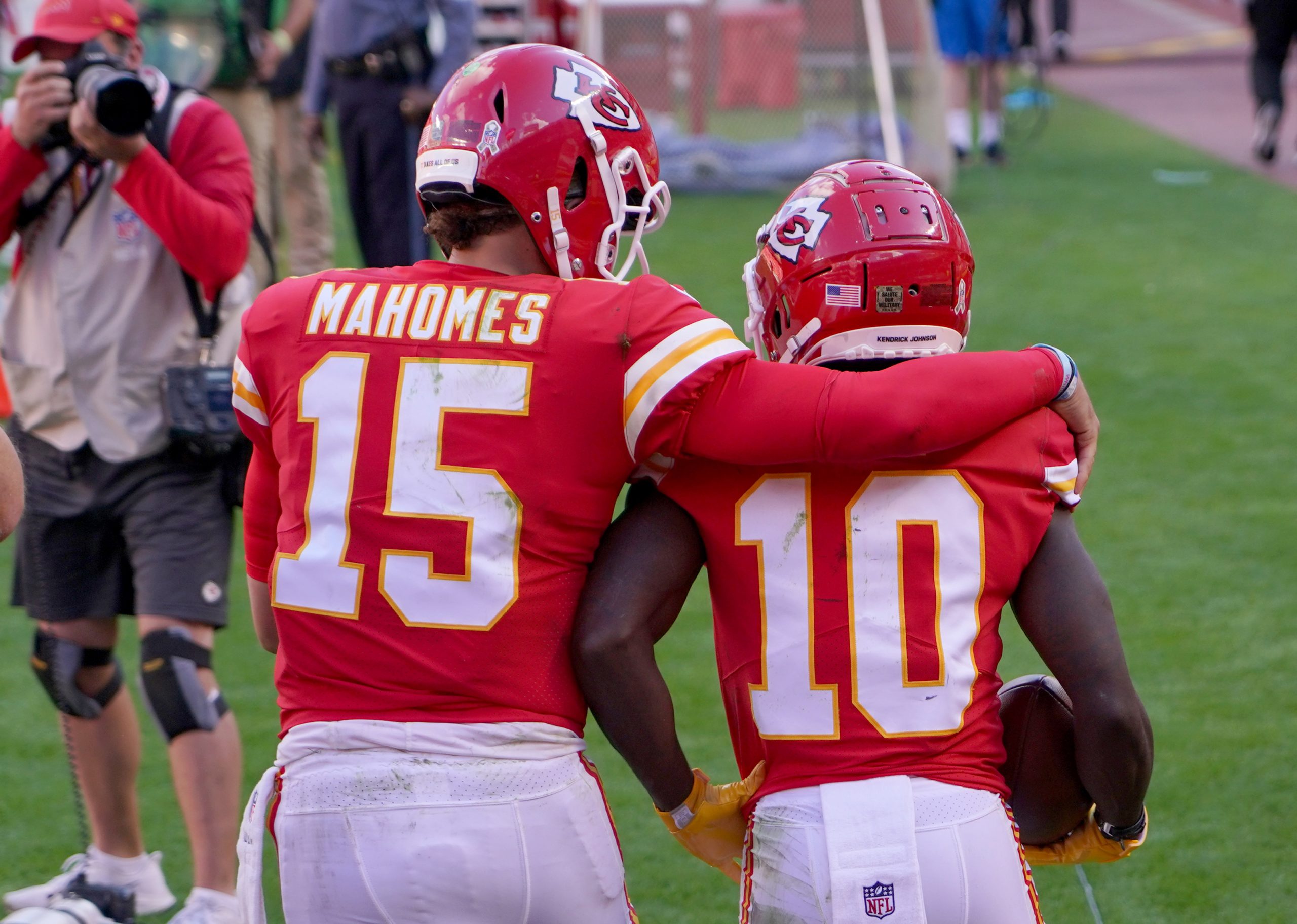 Kansas City Chiefs wide receiver Tyreek Hill (10) celebrates with quarterback Patrick Mahomes (15) after scoring against the Carolina Panthers during the second half at Arrowhead Stadium.