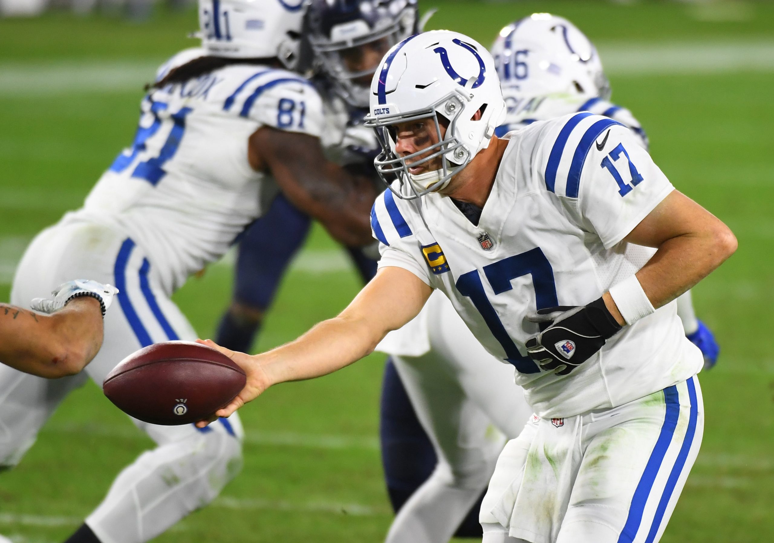 Indianapolis Colts quarterback Philip Rivers hands the ball off during win over Titans on Thursday Night Football