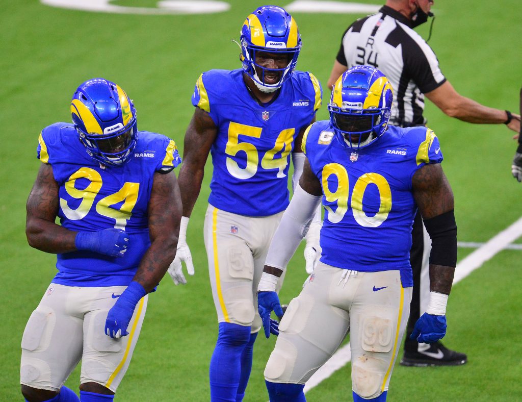 Los Angeles Rams defensive end Michael Brockers (90) reacts with defensive end Rasheem Green (94) after sacking Seattle Seahawks quarterback Russell Wilson (3).