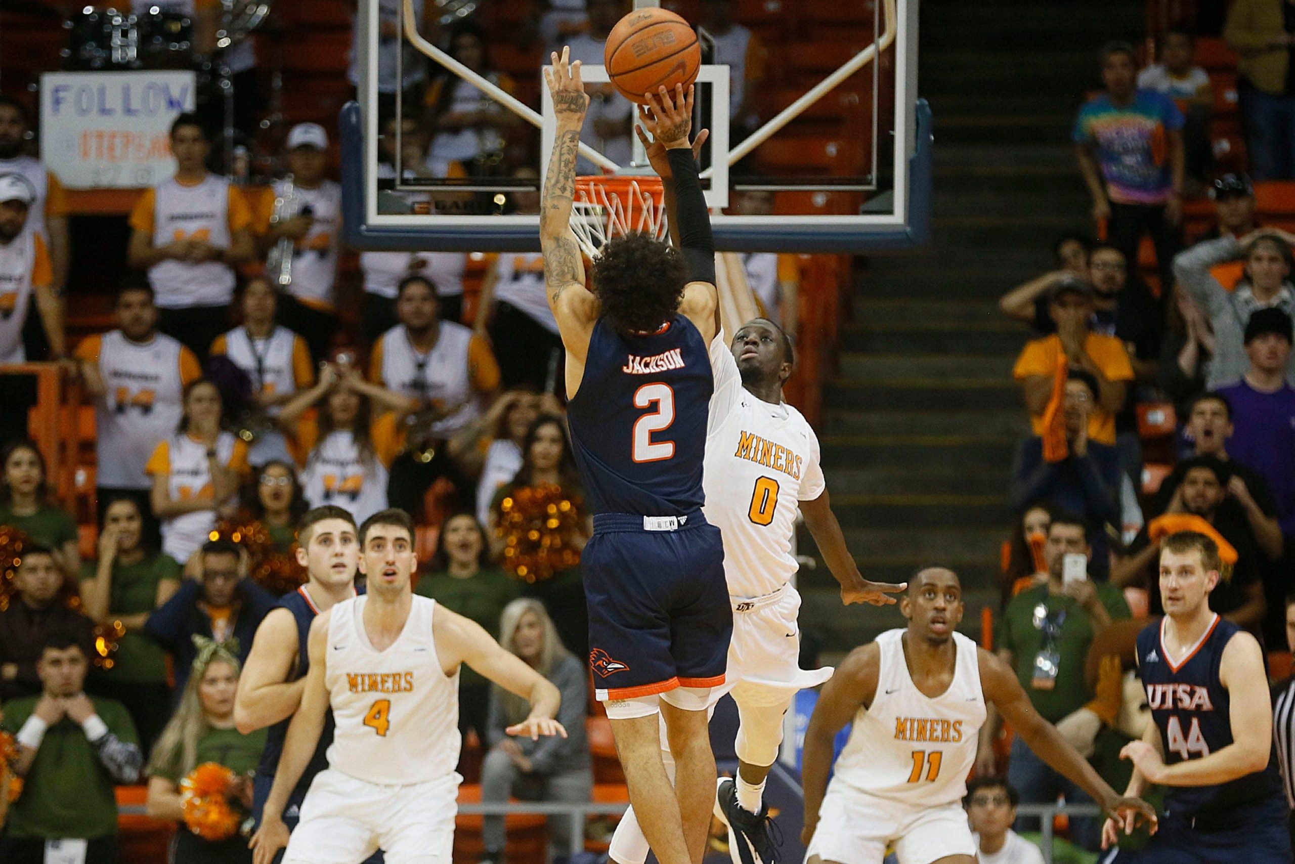 UTSA guard Jhivvan Jackson shoots over UTEP's Souley Boum