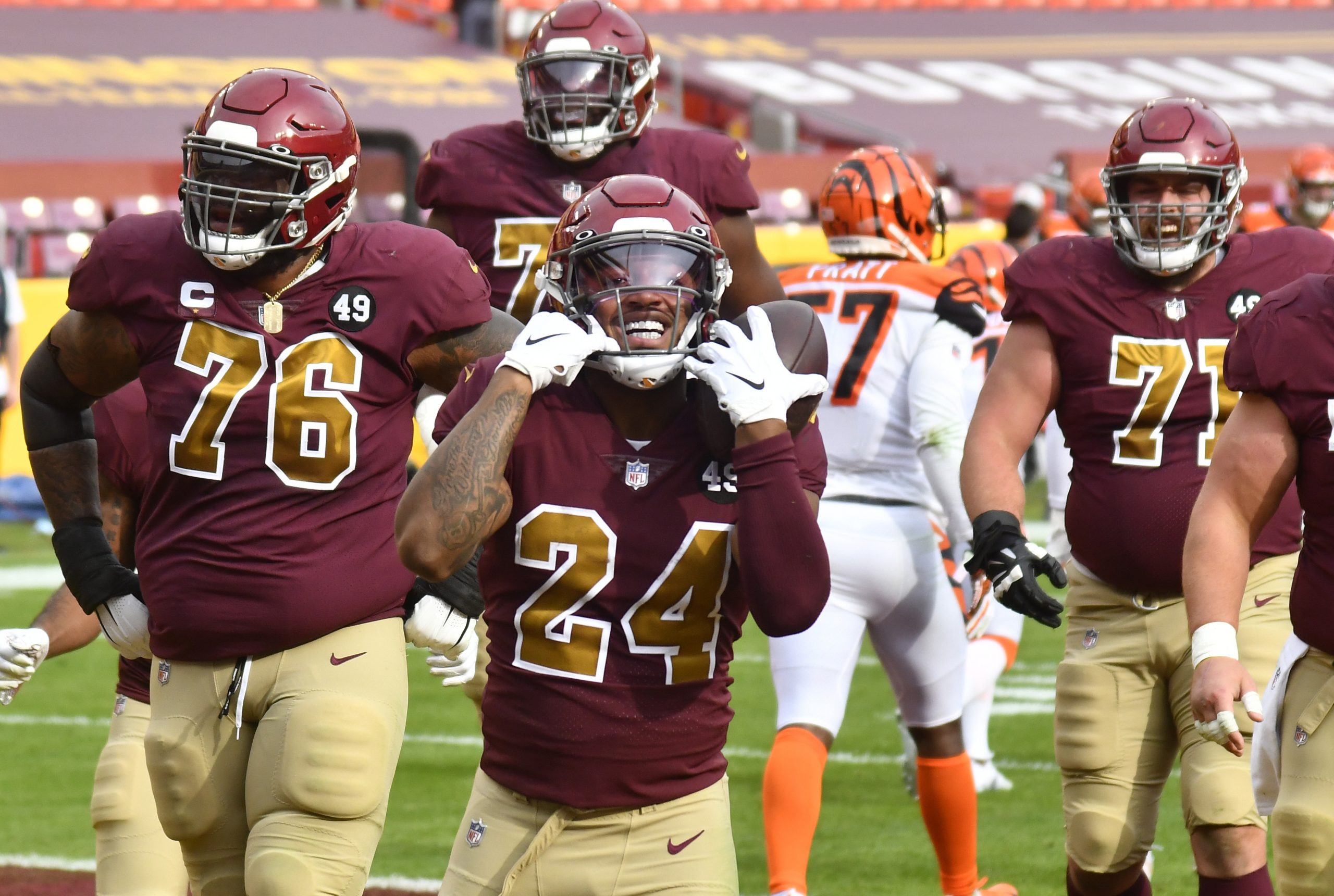 Washington Football Team running back Antonio Gibson (24) celebrates after scoring a touchdown against the Cincinnati Bengals during the first quarter at FedExField.